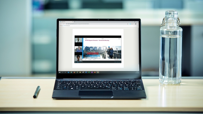 Laptop auf dem ein Online-Seminar von Endress+Hauser läuft.