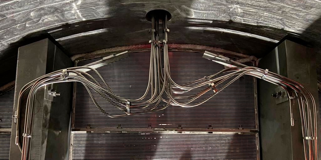 Détermination 3D du profil de température dans un réacteur
